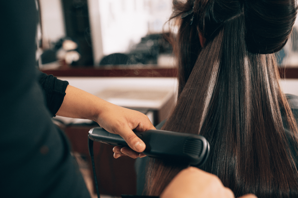 Hair ironing female
